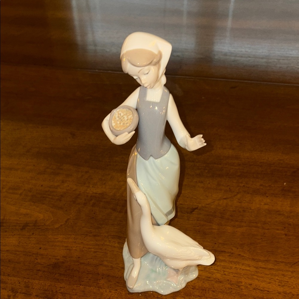 Lladro Porcelain Figurine with Blue Accents